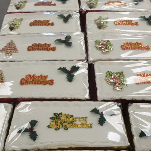 1/2 of a 7 inch Iced on Top Christmas Cake